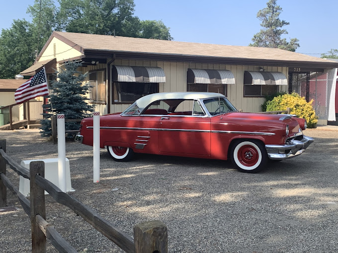 Merc in Front of Business